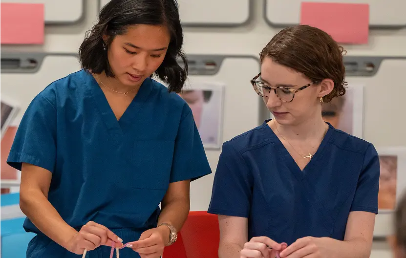 Two female health care students