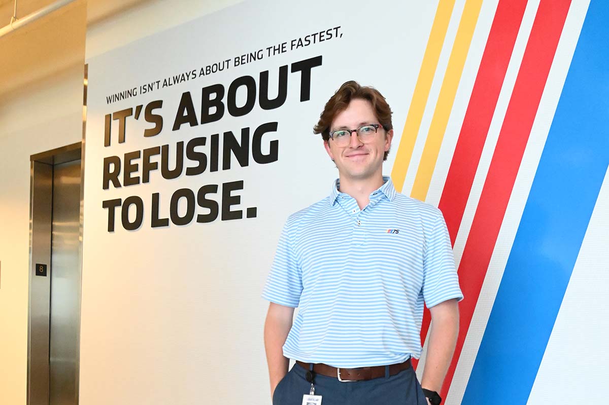 Photo of an Elon student at their internship at NASCAR